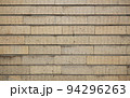煉瓦タイル壁テクスチャ_アンティークな雰囲気の背景 94296263