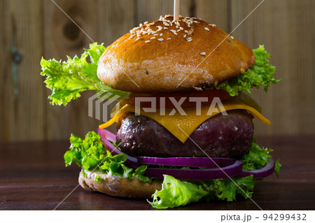 Nutritious burger with big meat cutlet 94299432