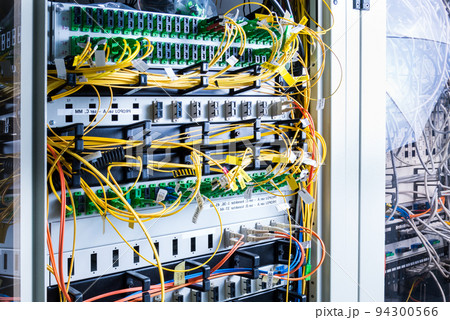 server inside data center with ethernet cables connected to data switch server inside data center with ethernet cables connected to data switch 94300566