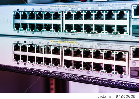empty ethernet switch panels inside data center 94300609