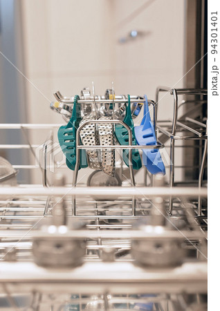 Surgical and dental instruments at medical washing machine and autoclave for sterilising. Medical hygiene for using equipments. Surgical and dental instruments at medical washing machine and autoclave for sterilising. Medical hygiene for using equipments. 94301401