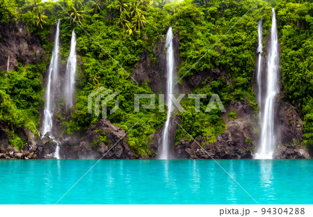 Beautiful waterfall with sunlight in jungle, paradise fantasy island. 3D Illustration 94304288