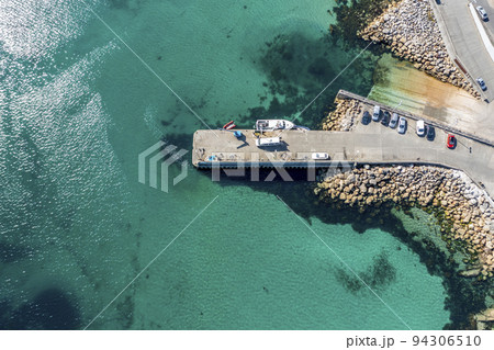 Aerial view of the pier at Leabgarrow on Arranmore Island in County Donegal, Republic of Ireland 94306510
