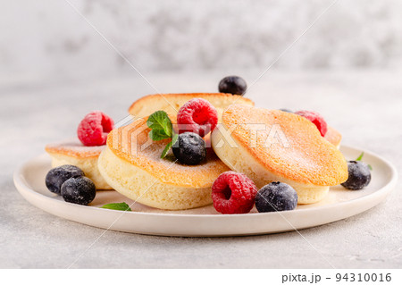 Japanese soft pancakes with berries Japanese soft pancakes with berries 94310016