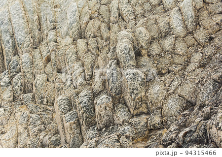 natural background, rock texture from weathered columnar basalt natural background, rock texture from weathered columnar basalt 94315466