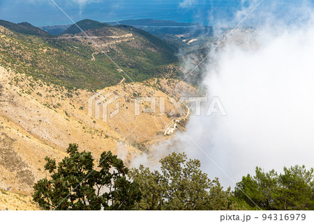 Landscape in the clouds under Mount Pantokrator on the island of Corfu 94316979