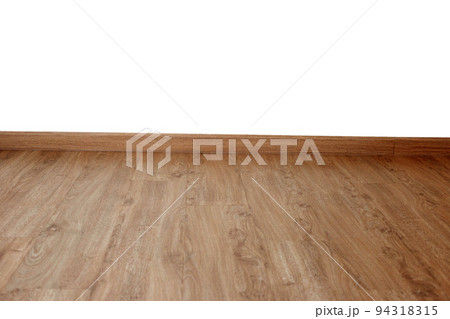 Laminate wood floor with blank white wall 94318315