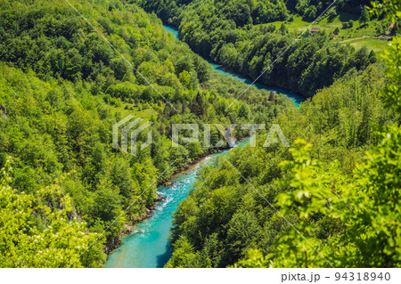Montenegro natural landscape, mountain river Tara Portrait of a disgruntled girl sitting at a cafe table 94318940