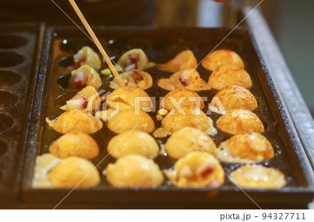 Takoyaki being prepared in Ho Thi Ky street food Takoyaki being prepared in Ho Thi Ky street food 94327711