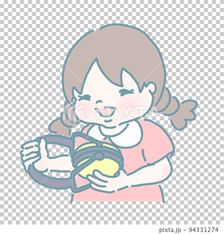 聴覚過敏用イヤーマフを手に取る女の子(パステルカラー) 94331274