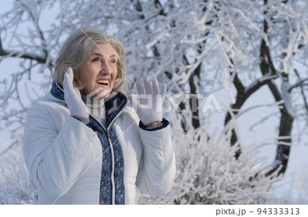 Old woman in a fur coat in the winter  Old woman in a fur coat in the winter  94333313