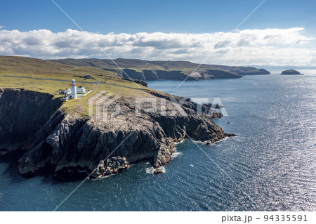 Aerial view of the lighthouse on the island of Arranmore in County Donegal, Ireland 94335591