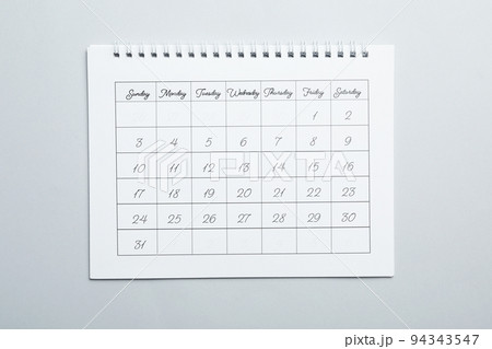 Paper calendar on light grey background, top view 94343547