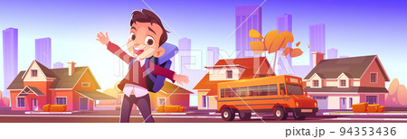 Happy boy waiting school bus in city suburb 94353436