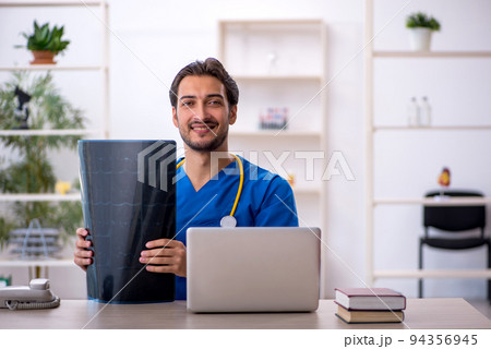 Young male doctor radiologist working in the clinic 94356945