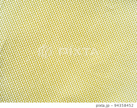 Bulletproof material aramid. Aramid kevlar background. Golden kevlar texture and pattern. Bulletproof material aramid. Aramid kevlar background. Golden kevlar texture and pattern. 94358452