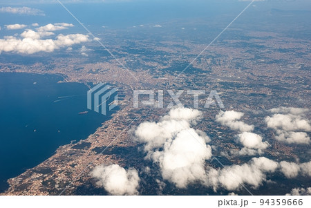 Aerial view of city on the coastline above Italiay Aerial view of city on the coastline above Italiay 94359666