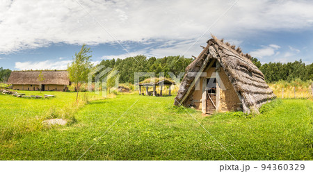 house with straw thatched roof at in an ancient village, Celtic open air museum in Nasavrky, Czech republic house with straw thatched roof at in an ancient village, Celtic open air museum in Nasavrky, Czech republic 94360329