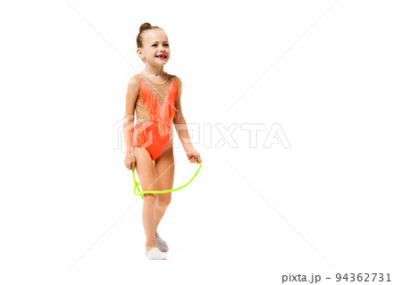 Happy female sporty child jump with rope 94362731