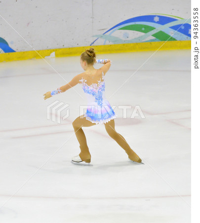 Girl figure skating 94363558