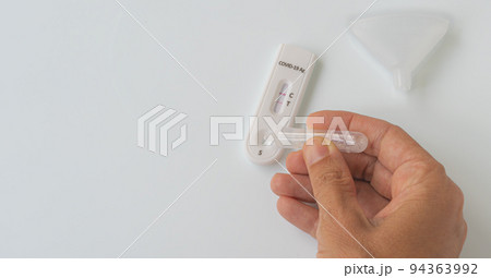 Making Coronavirus antigen test with positive result. Making Coronavirus antigen test with positive result. 94363992