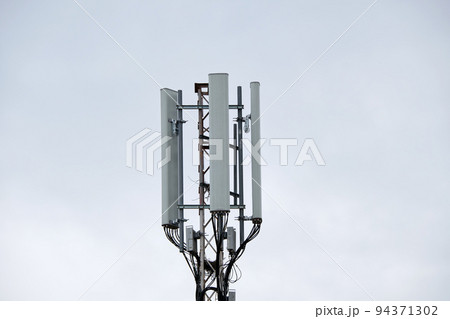 Wireless Communication Antenna Various GPS, cellphone, 3G, 4G and 5G equipped telecommunication tower on blue sky copy space background 94371302