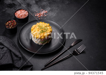 Fresh vegetable salad with corn, pepper, crab, cucumber, eggs and mayonnaise Fresh vegetable salad with corn, pepper, crab, cucumber, eggs and mayonnaise 94371545