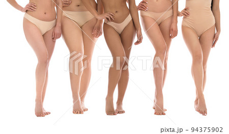 Group of women with different body types in underwear on white background, closeup Group of women with different body types in underwear on white background, closeup 94375902