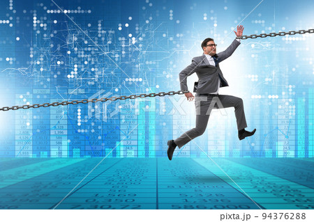 Chained businessman in workaholic concept 94376288