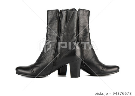 Pair of women's black autumn mid-heel ankle boots with a zip fastening. Pair of women's black autumn mid-heel ankle boots with a zip fastening. 94376678