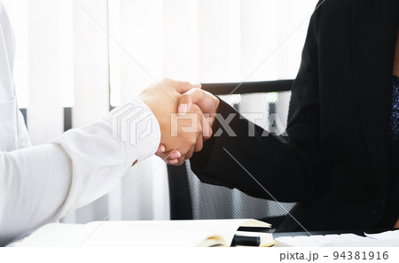 Young businessmen collaborate with partners to increase their business investment network for Plans to improve quality next month in their office. agreement concept. Young businessmen collaborate with partners to increase their business investment network for Plans to improve quality next month in their office. agreement concept. 94381916