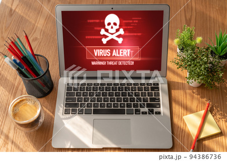 Virus warning alert on computer screen detected modish cyber threat Virus warning alert on computer screen detected modish cyber threat 94386736