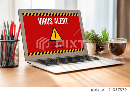 Virus warning alert on computer screen detected modish cyber threat Virus warning alert on computer screen detected modish cyber threat 94387370
