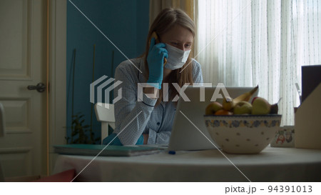 Portrait of woman working from home Portrait of woman working from home 94391013