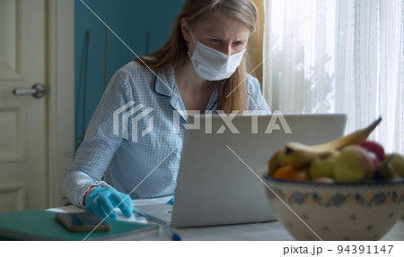 Portrait of woman working from home Portrait of woman working from home 94391147