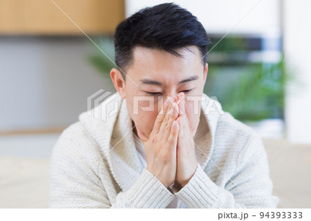 young asian man sitting on sofa at home pensive, worried about problems and depression. male has an experience relationships at work or family, problems with loan repayment debt Seriously conceived young asian man sitting on sofa at home pensive, worried about problems and depression. male has an experience relationships at work or family, problems with loan repayment debt Seriously conceived 94393333