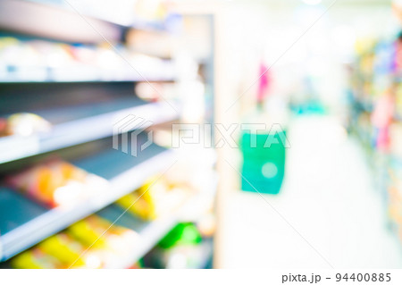 Blurred supermarket food on shelf aisle with bokeh Blurred supermarket food on shelf aisle with bokeh 94400885