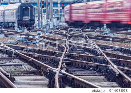 Passenger train moves at morning time. Passenger train moves at morning time. 94403898
