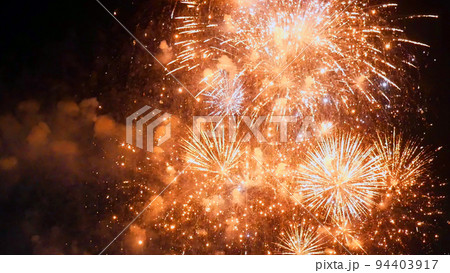 Golden Firework celebrate anniversary happy new year 2023, 4th of july holiday festival. Gold firework in the night time celebrate national holiday. Countdown to new year 2022 gold party time event Golden Firework celebrate anniversary happy new year 2023, 4th of july holiday festival. Gold firework in the night time celebrate national holiday. Countdown to new year 2022 gold party time event 94403917