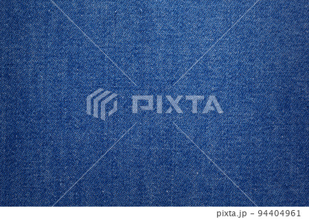 Blue jeans denim background texture. Jeans fabric as material surface Blue jeans denim background texture. Jeans fabric as material surface 94404961