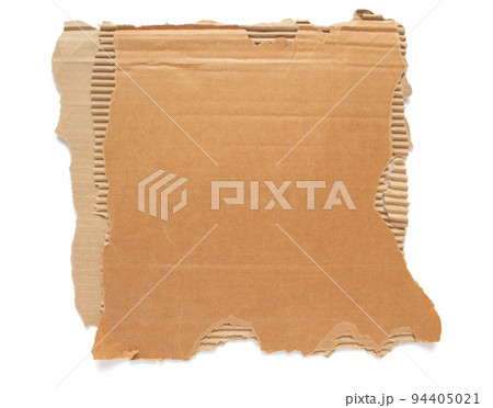 Piece of cardboard torn edge isolated on white background. Brown ripped paper 94405021