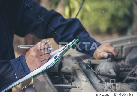 Mechanic car service auto garage in automotive mobile center. Technician workshop repair engine motor vehicles service mechanical engineering business. Automobile mechanic hands car repairs technic Mechanic car service auto garage in automotive mobile center. Technician workshop repair engine motor vehicles service mechanical engineering business. Automobile mechanic hands car repairs technic 94405765