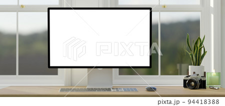 Home or office working space against the window with white pc desktop computer mockup 94418388