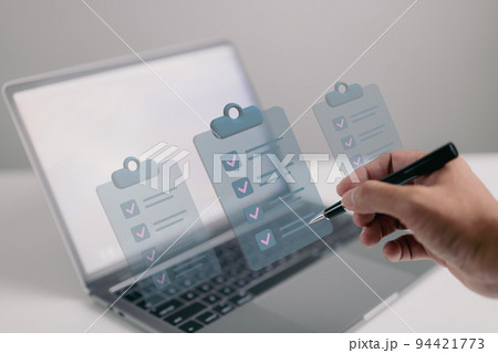 Businessman mark checklist with pen. Completion business task. Goal achievements planning schedule concept. 94421773