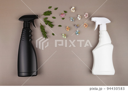 Black and white cleaning bottles. 94430583