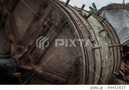 Details of Antique old large wooden barrels for the tanning of cattle leather was left to deteriorate over time. 94432635