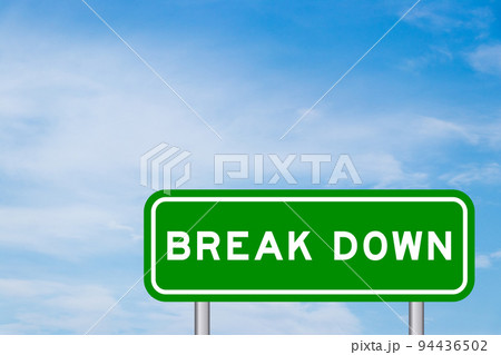 Green color transportation sign with word break down on blue sky with white cloud background 94436502