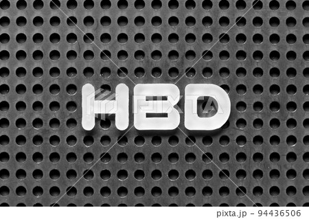 White alphabet letter in word HBD (Abbreviation of happy birthday) on black pegboard background 94436506