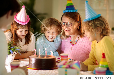 Child birthday party cake. Family with kids. 94441724