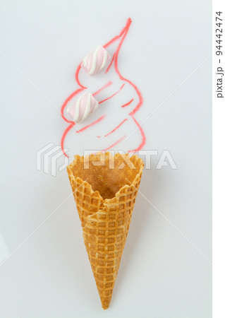 Real waffle cone with marshmallows and hand drawn cream. Real waffle cone with marshmallows and hand drawn cream. 94442474